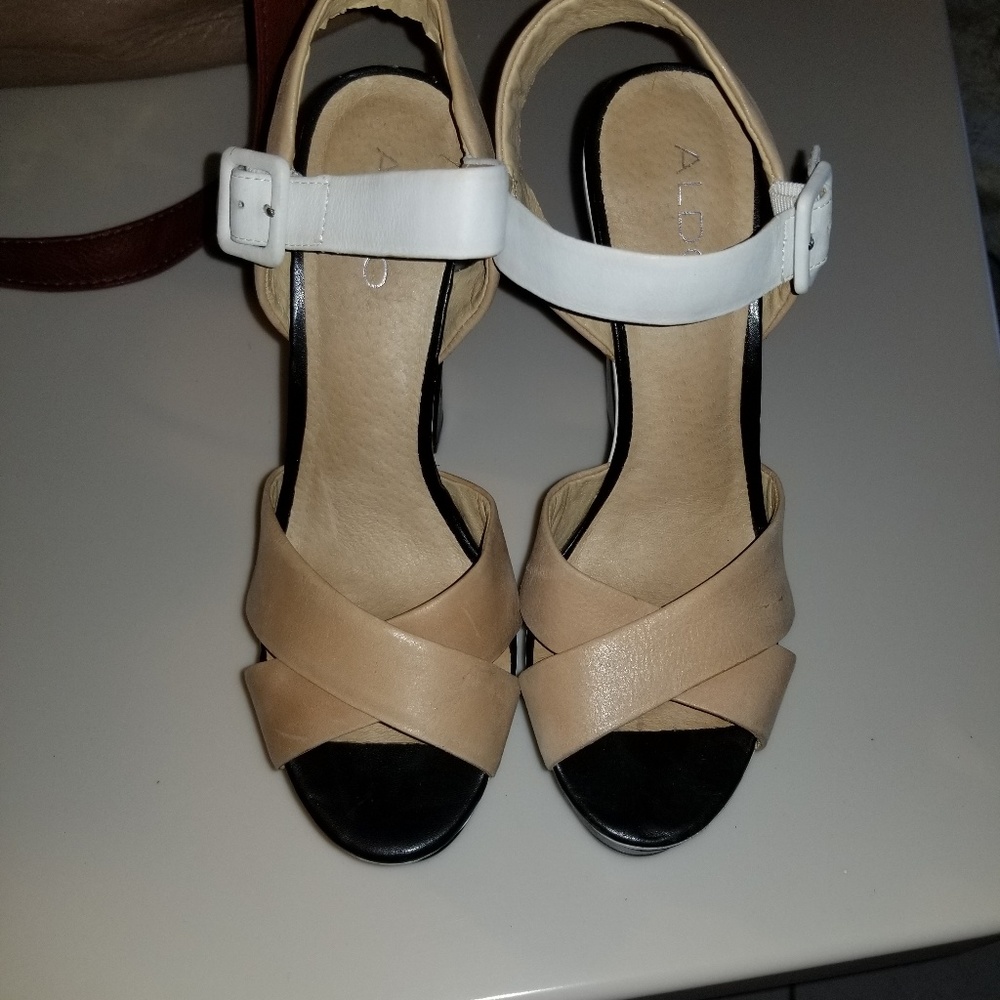 Aldo ran leather high heels.